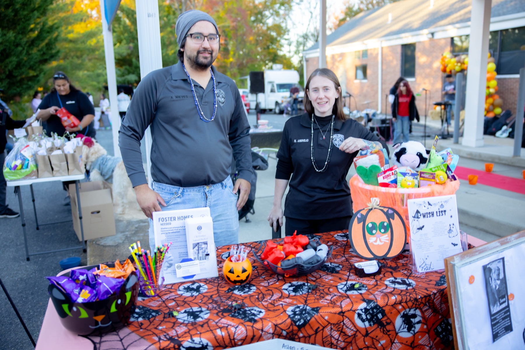 Old Bridge Animal Shelter representatives at their decorated table during SiRa's 2025 event