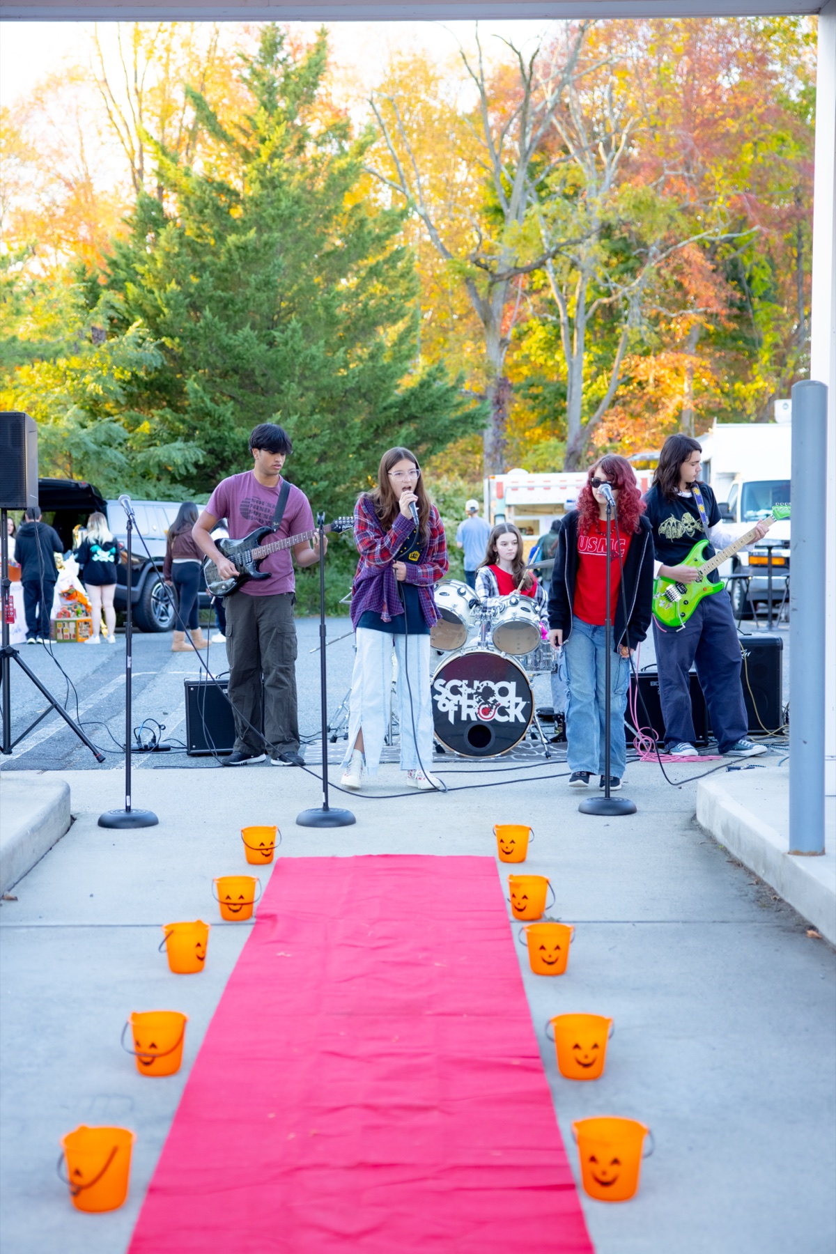 A student band playing beside the pet runway at SiRa's 2025 event
